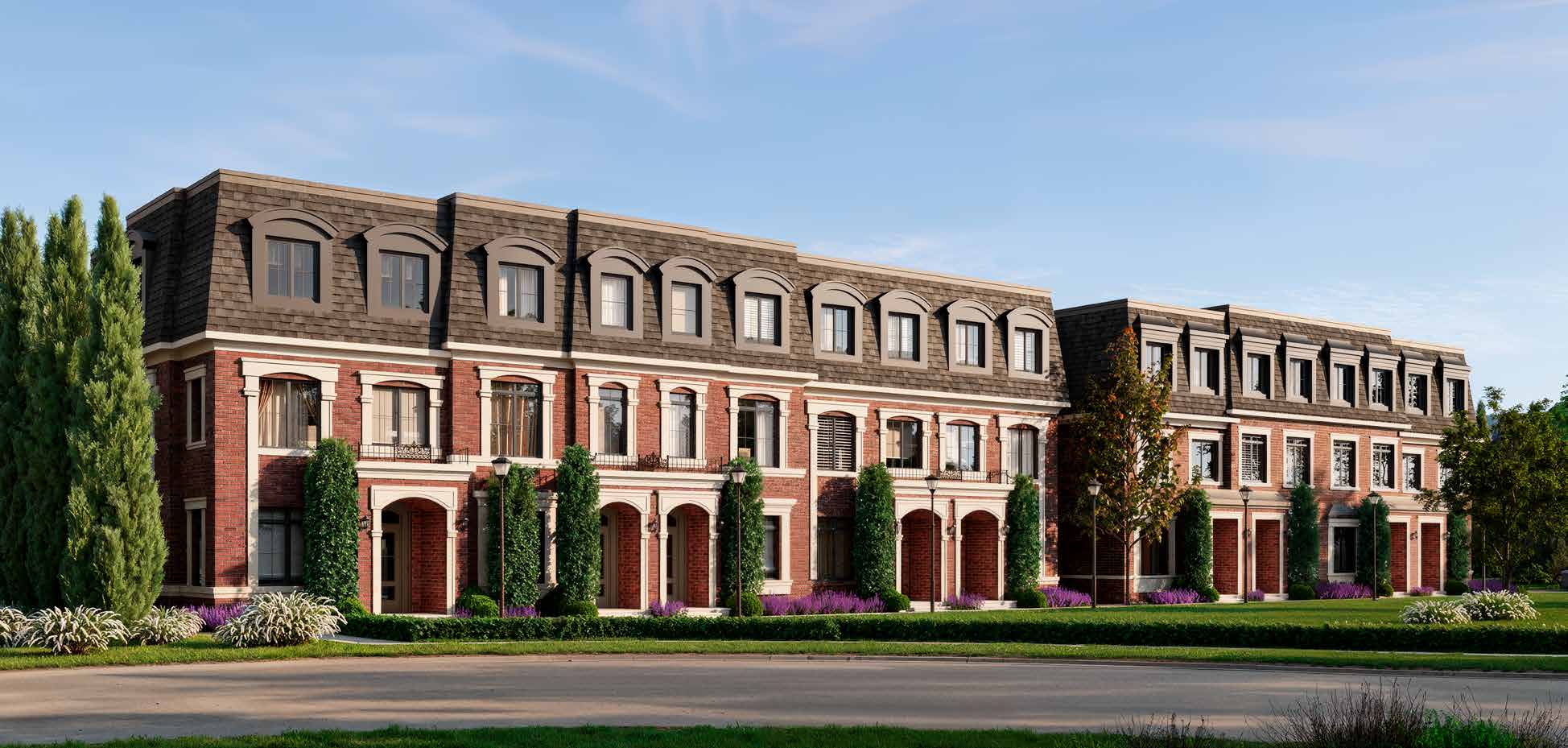 Artist's concept of Blocks 1 and 2: red brick townhomes with stone arches and mansard roofs along a lawn